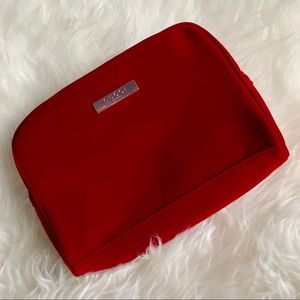 Red Gucci parfums bag